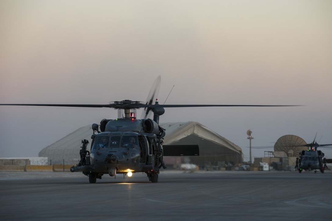 HH-60G Pave Hawk Helicopters assigned to the 46th Expeditionary Rescue
Squadron, return to base following the completion of a sortie, October 24,
2017 in an undisclosed location. Rescue teams-comprised of pilots, special
missions aviators, and pararescuemen - work together to maintain a constant
state of readiness. (U.S. Air Force photo by Staff Sgt. Joshua Kleinholz)