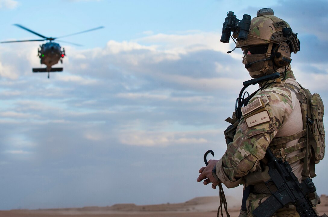 A pararescueman awaits the arrival of an HH-60G Pave Hawk helicopter
assigned to the 46th Expeditionary Rescue Squadron during a training
scenario November 22, 2017, in an undisclosed location. Employing air power
across the region in support of Operation Inherent Resolve requires trained
operators be on-alert to respond should an aircrew ever become isolated in
hostile territory. (U.S. Air Force photo by Staff Sgt. Joshua Kleinholz