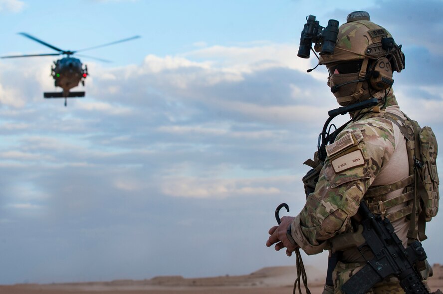 A pararescueman awaits the arrival of an HH-60G Pave Hawk helicopter
assigned to the 46th Expeditionary Rescue Squadron during a training
scenario November 22, 2017, in an undisclosed location. Employing air power
across the region in support of Operation Inherent Resolve requires trained
operators be on-alert to respond should an aircrew ever become isolated in
hostile territory. (U.S. Air Force photo by Staff Sgt. Joshua Kleinholz