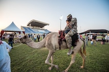 Qatar Emiri Air Force hosts a cultural exchange for coalition partners and families