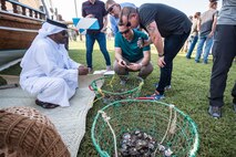 Qatar Emiri Air Force hosts a cultural exchange for coalition partners and families