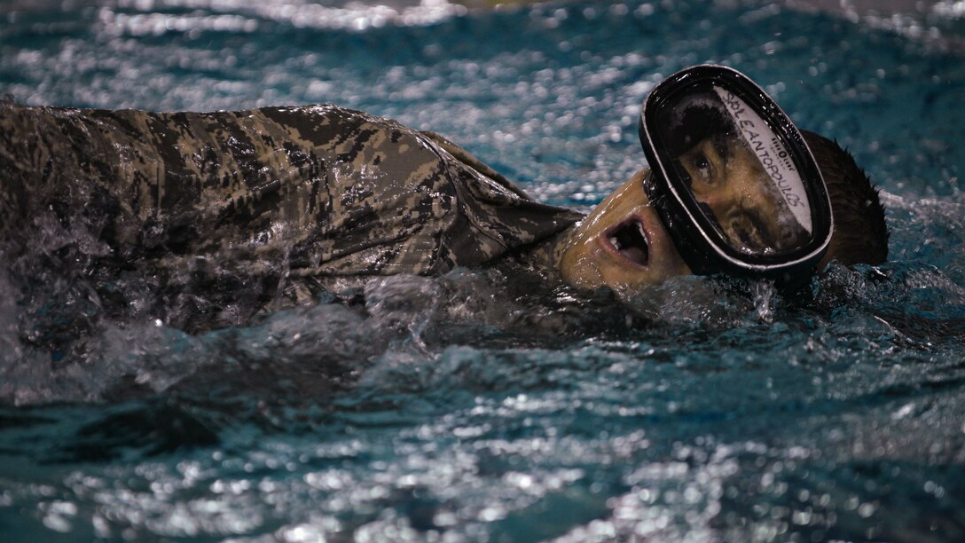 U.S. Air Force Staff Sgt. Michael Svoleantopoulos, 497th Operations Support Squadron tactician, swims during pararescue pre-training at Joint Base Langley-Eustis, Va., Sept. 28, 2017