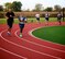 Making her way quickly around the last lap of a recent 1.5 mile fitness test is Tech. Sgt. Stephanie Johnson, wearing the number three jersey, at Scott Air Force Base, Ill.  She scored a perfect 100 points on her overall fitness test and had some tips for others to improve in the future:  