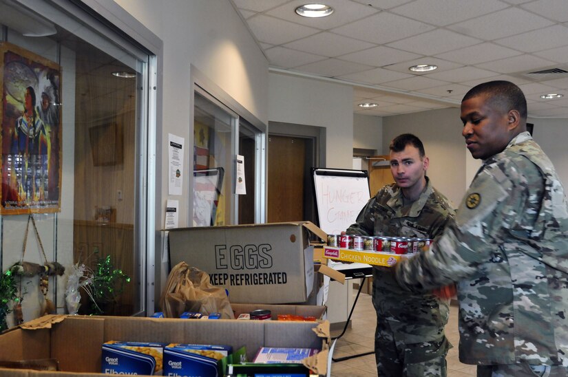 316th ESC Soldiers collect toys, food, and give time for charities