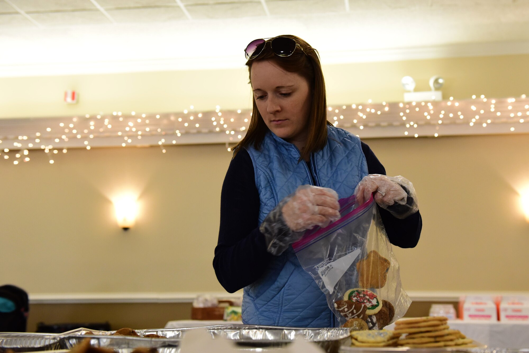 Jeannie Mooney packs cookies during the annual Airmen Cookie Drive Dec. 4, 2017, at Seymour Johnson Air Force Base, North Carolina.