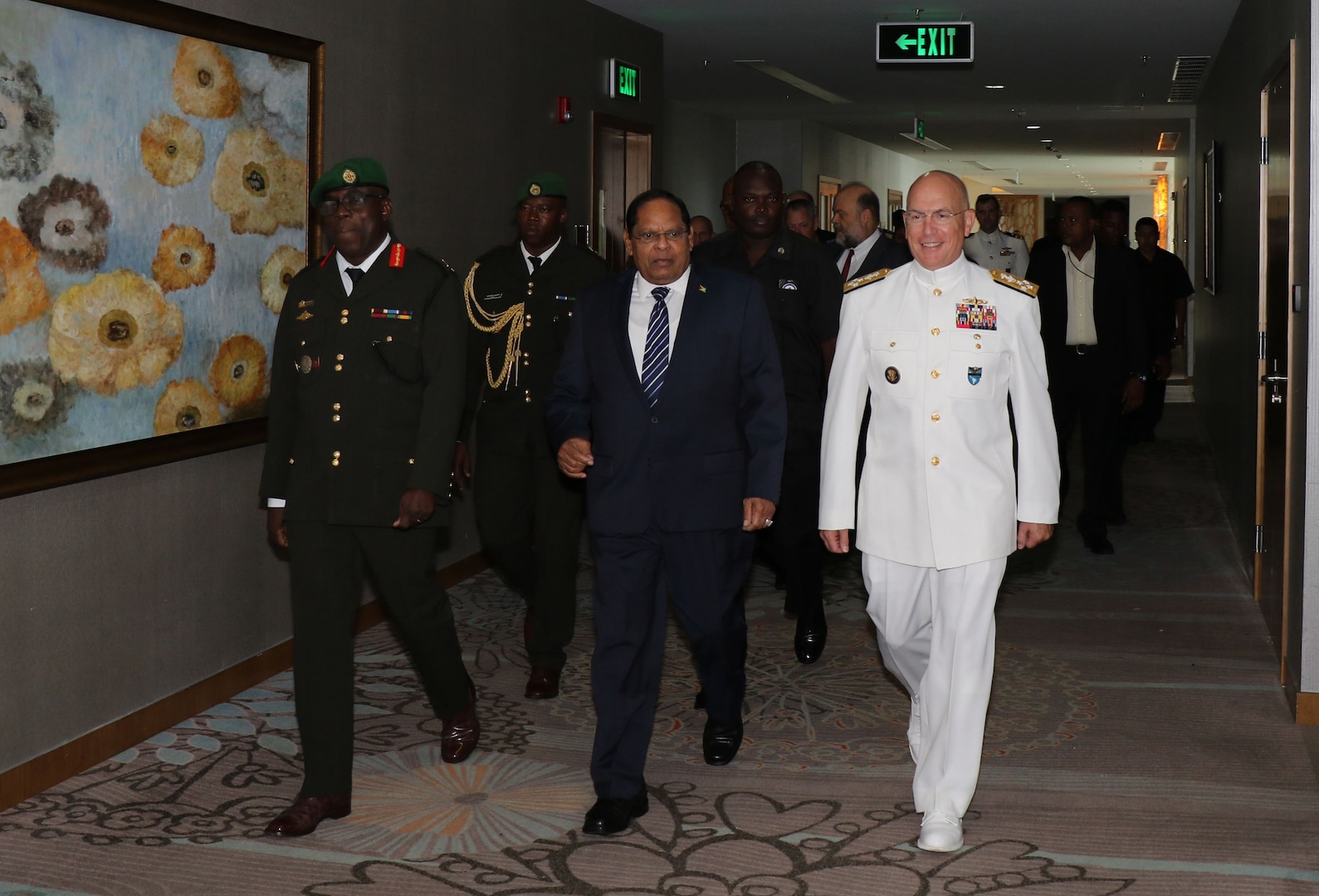 Military leaders walk together in Guyana.