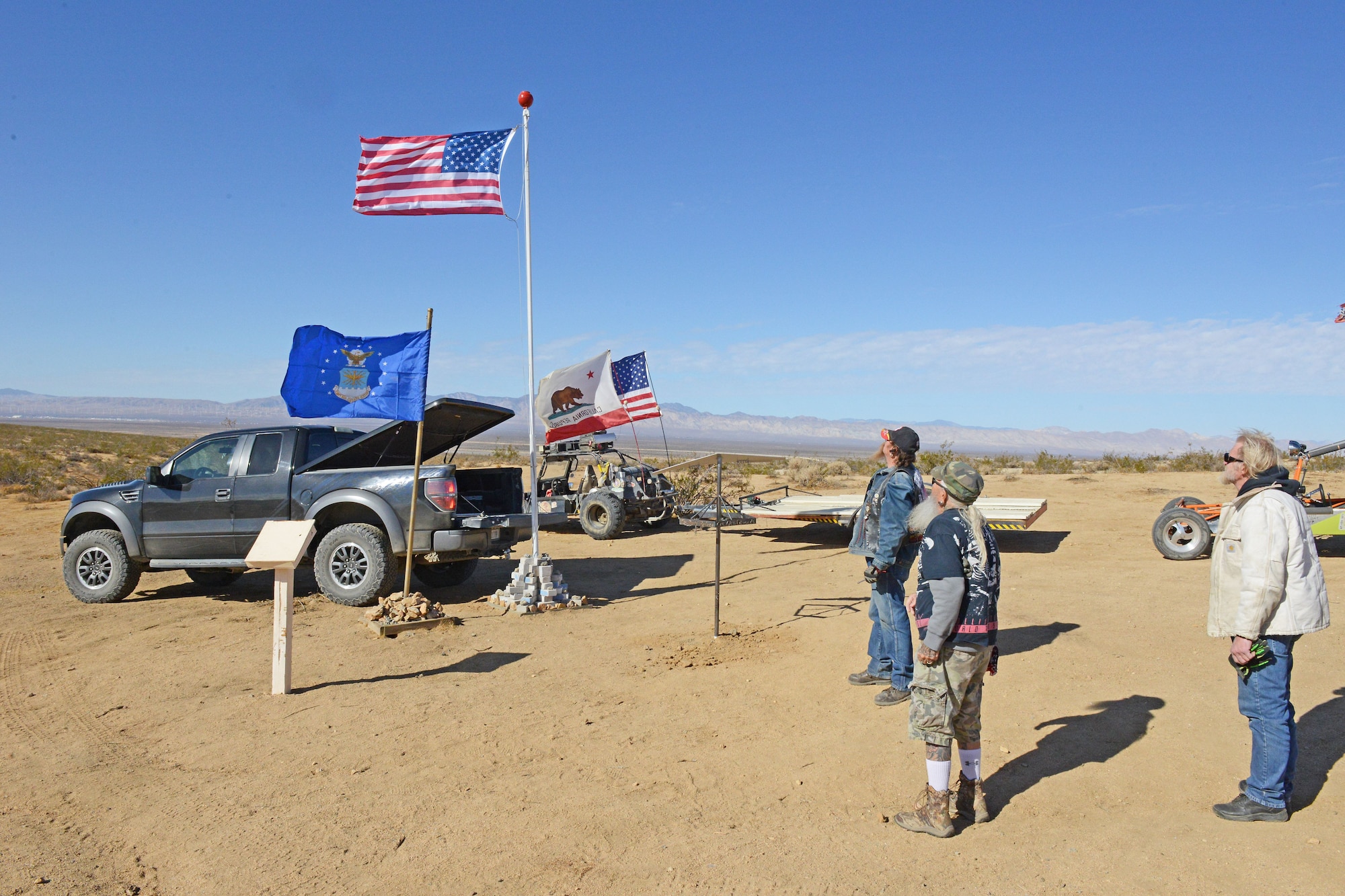 Cal City VFW post refreshes flag at flying wing crash site