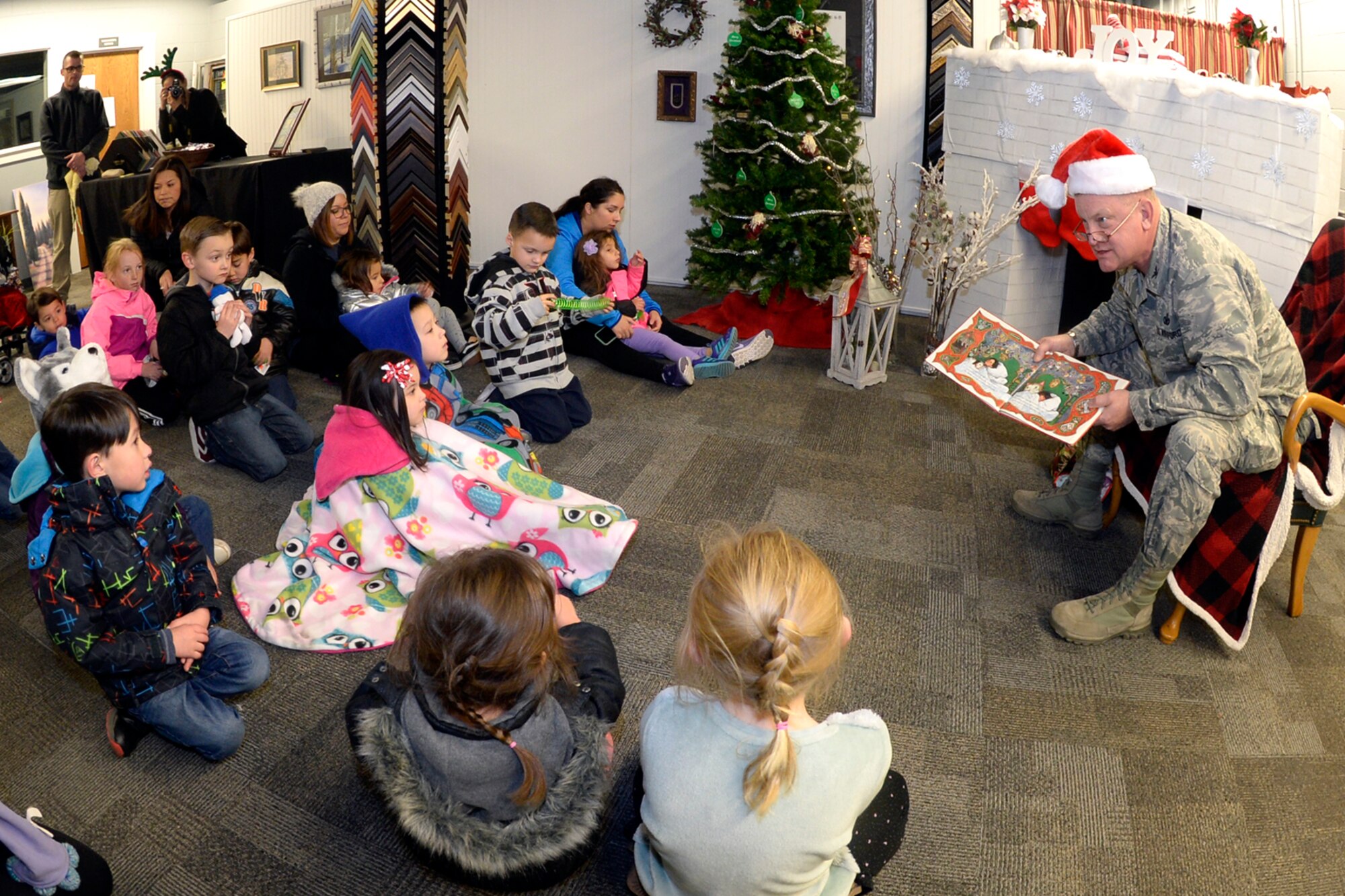 CHILDREN JOIN SANTA TO BRING IN THE HOLIDAYS