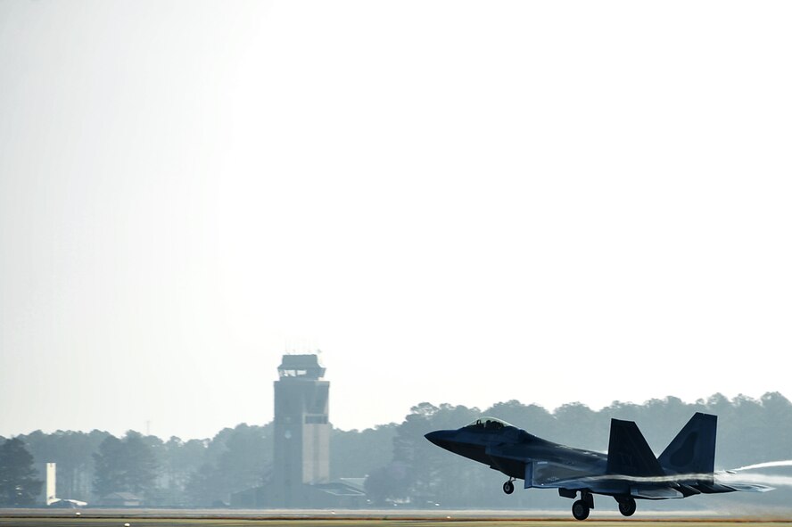 A U.S. Air Force F-22 Raptor assigned to Tyndall Air Force Base (AFB), Fla., departs for basic fighter maneuver (BFM) training at Shaw AFB, S.C., Dec. 1, 2017.