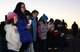 Ellsworth families take a moment to pray before kicking off the Base Holiday Tree Lighting Ceremony at Ellsworth Air Force Base, S.D., Dec. 1, 2017. This annual event helps start off the holiday season by celebrating several religious holidays including Christmas, Hanukkah and Kwanzaa. (U.S. Air Force photo by Airman 1st Class Donald C. Knechtel)