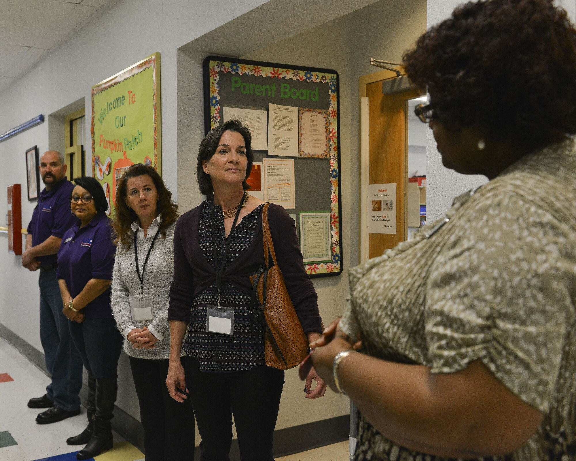 Sara Holmes, wife of U.S. Air Force Gen. Mike Holmes, commander of Air Combat Command is given a tour of the Child Development Center on Joint Base Langley-Eustis, Va., Dec. 1, 2017.