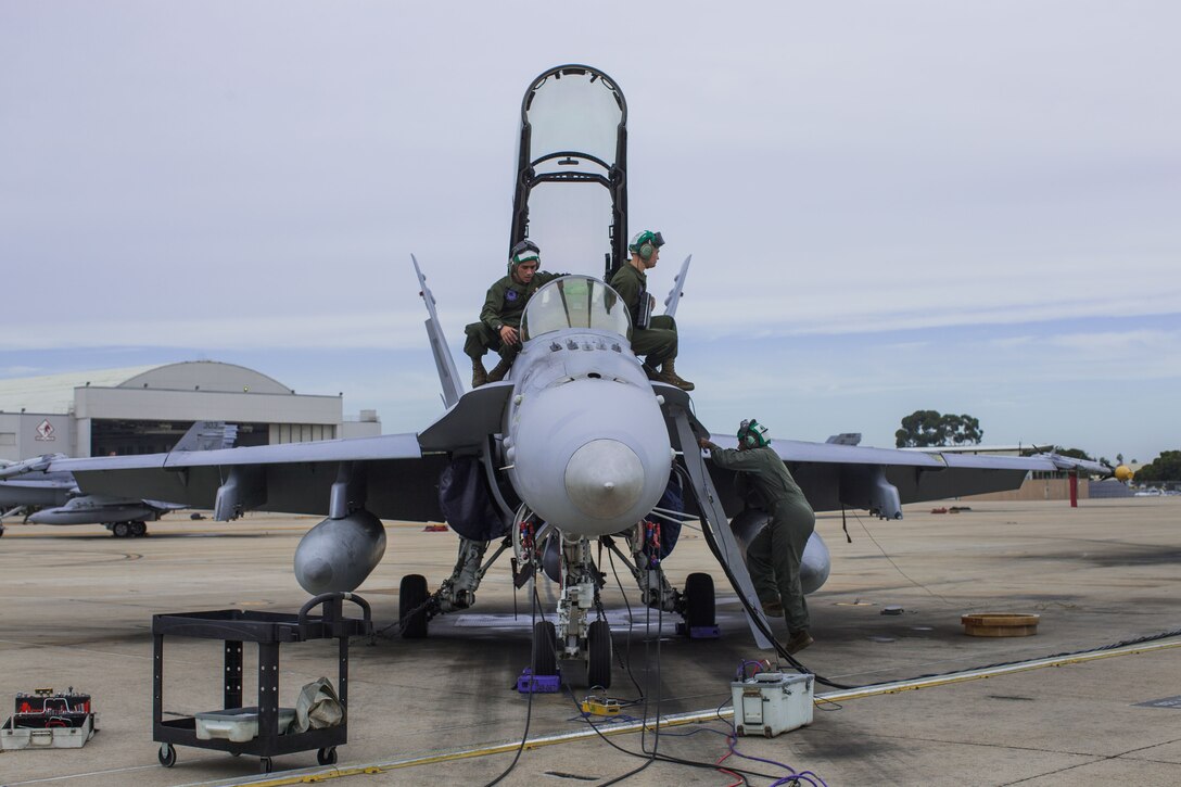 Marine Corps Air Station Miramar, Calif. – Marines with Marine Fighter Attack Squadron [VMFA(AW)] 225 prepare an F/A-18D Hornet to support missions for Exercise Winter Fury 18 on Marine Corps Air Station Miramar, Calif., Nov. 30. Winter Fury is an opportunity for 3rd Marine Aircraft Wing to exercise the skills needed as the aviation combat element of a Marine Air Ground Task Force during a combat deployment. (U.S. Marine Corps photo by Lance Cpl. Nadia J. Stark/Released)