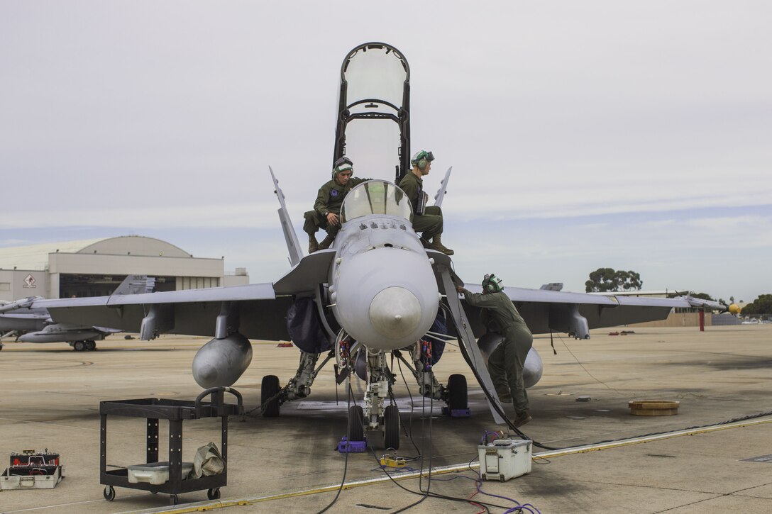 Marine Corps Air Station Miramar, Calif. – Marines with Marine All-Weather Fighter Attack Squadron  [VMFA(AW)] 225 prepare an F/A-18D Hornet to support missions for Exercise Winter Fury 18 on Marine Corps Air Station Miramar, Calif., Nov. 30. Winter Fury is an opportunity for 3rd Marine Aircraft Wing to exercise the skills needed as the aviation combat element of a Marine Air Ground Task Force during a combat deployment. (U.S. Marine Corps photo by Lance Cpl. Nadia J. Stark/Released)