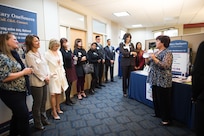 Spouses of Senior Enlisted Leaders from across the Department of Defense in the D.C. area for the Defense Senior Enlisted Leader Council visit Military OneSource at Rosslyn, Va., Nov. 30, 2017.