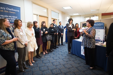 Spouses of Senior Enlisted Leaders from across the Department of Defense in the D.C. area for the Defense Senior Enlisted Leader Council visit Military OneSource at Rosslyn, Va., Nov. 30, 2017.