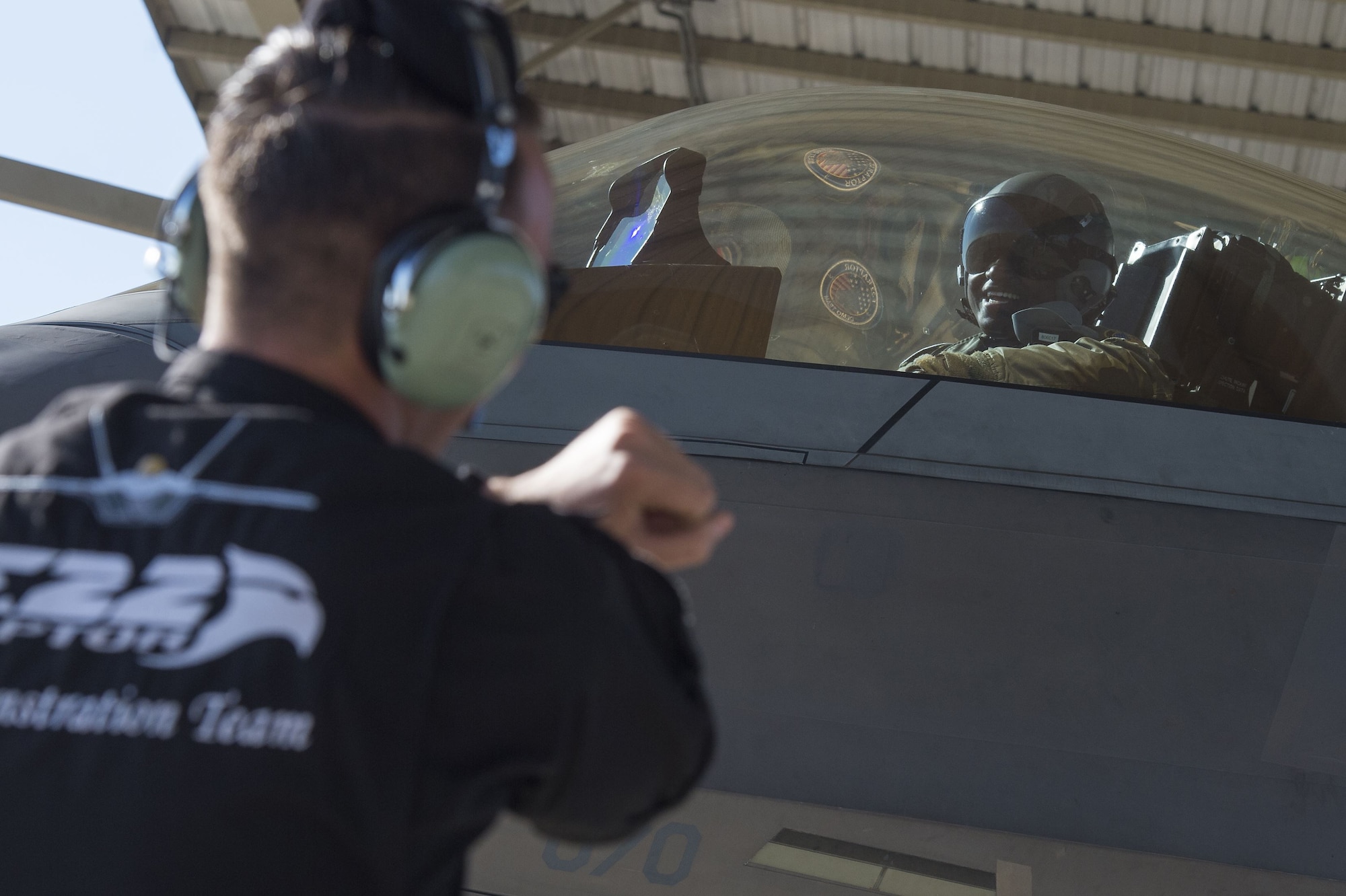 U.S. Air Force Maj. Paul Lopez, F-22 Raptor Demonstration Team pilot, smiles upon arrival at Shaw Air Force Base, S.C., Nov. 29, 2017. The F-22 Raptor Demonstration Team traveled to Shaw in order for Lopez, the newest member of the aerial demonstration team, to certify with Maj. Gen. Scott Zobrist, 9th Air Force commander. (U.S. Air Force photo by Staff Sgt. Zade Vadnais)