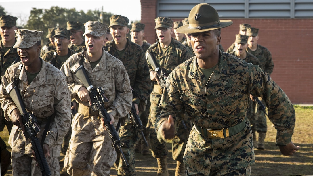 A Marine drill instructor leads his platoon.