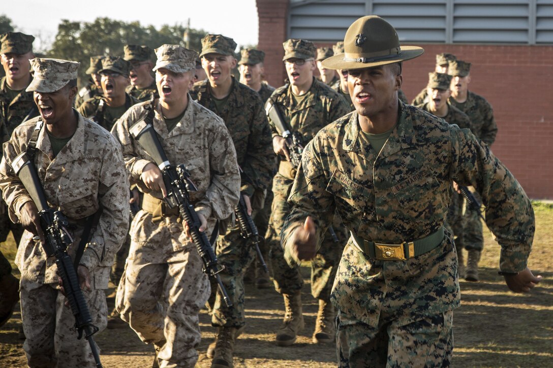 A Marine drill instructor leads his platoon.