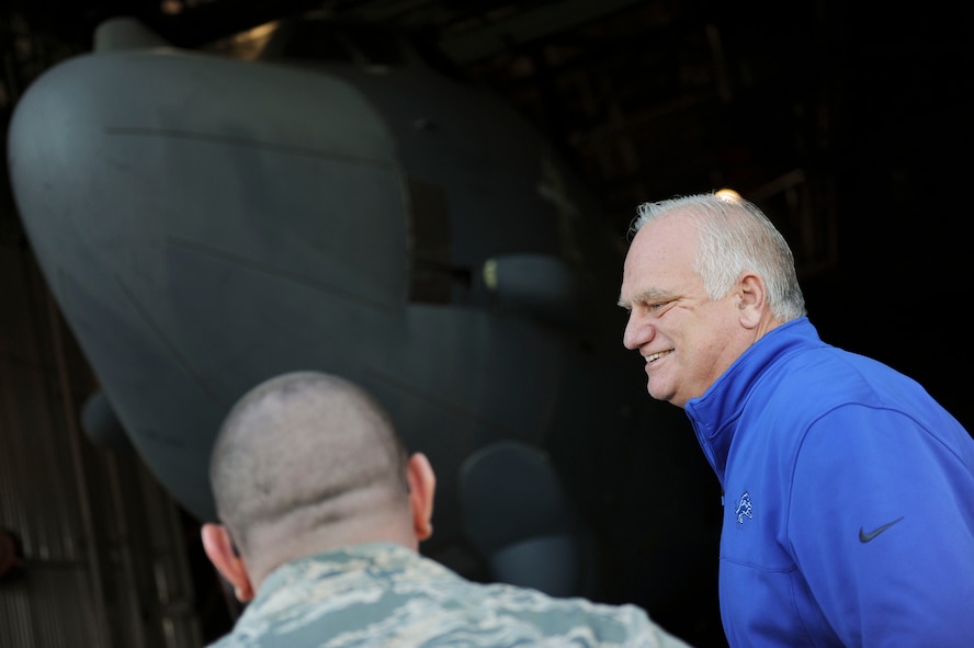 Eric Hipple, former Detroit Lions quarterback, tours a static B-52H Stratofortress at Minot Air Force Base, N.D., Nov. 28, 2017. After a decade-long football career, Hipple has committed himself to educating various military units, corporations and schools about mental health issues. (U.S. Air Force photo by Airman 1st Class Jessica Weissman)