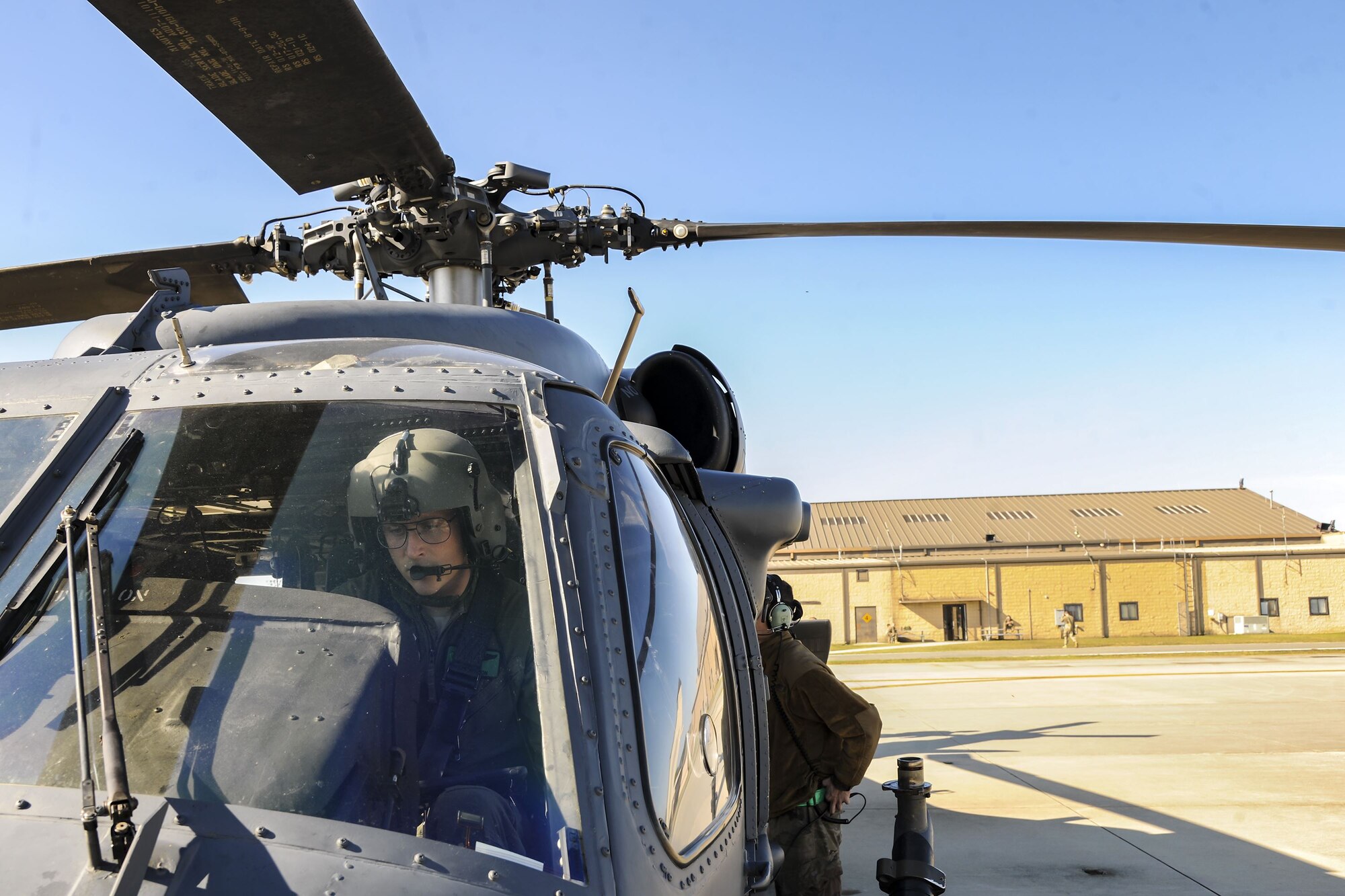 A pilot prepares to power down an HH-60G Pave Hawk following a hover test, Dec. 5, 2017, at Moody Air Force Base, Ga. As part of a Phase 1, Phase 2 exercise, the 23d Wing is evaluating its operations, maintenance and logistics to determine its readiness to rapidly deploy. The HH-60’s capabilities were tested to determine the 723d Aircraft Maintenance Squadron’s ability to make a helicopter operational. (U.S. Air Force photo by Airman Eugene Oliver)
