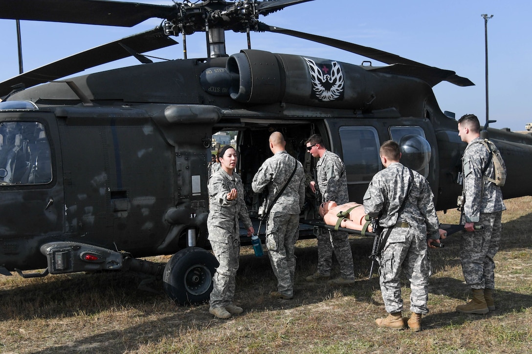 Soldiers train in a cold and hot loading exercise