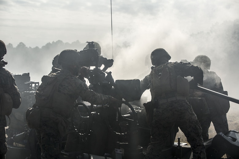 Marines sight-in on a target with an M777 A2 howitzer during a direct-fire exercise at Camp Lejeune, N.C., Dec. 4, 2017. The M777 provides timely, accurate and continuous indirect fire support, while having the capability to engage targets directly in the event of enemy contact. The Marines are with 1st Battalion 10th Marine Regiment. (U.S. Marine Corps photo by Cpl. Luke Hoogendam)