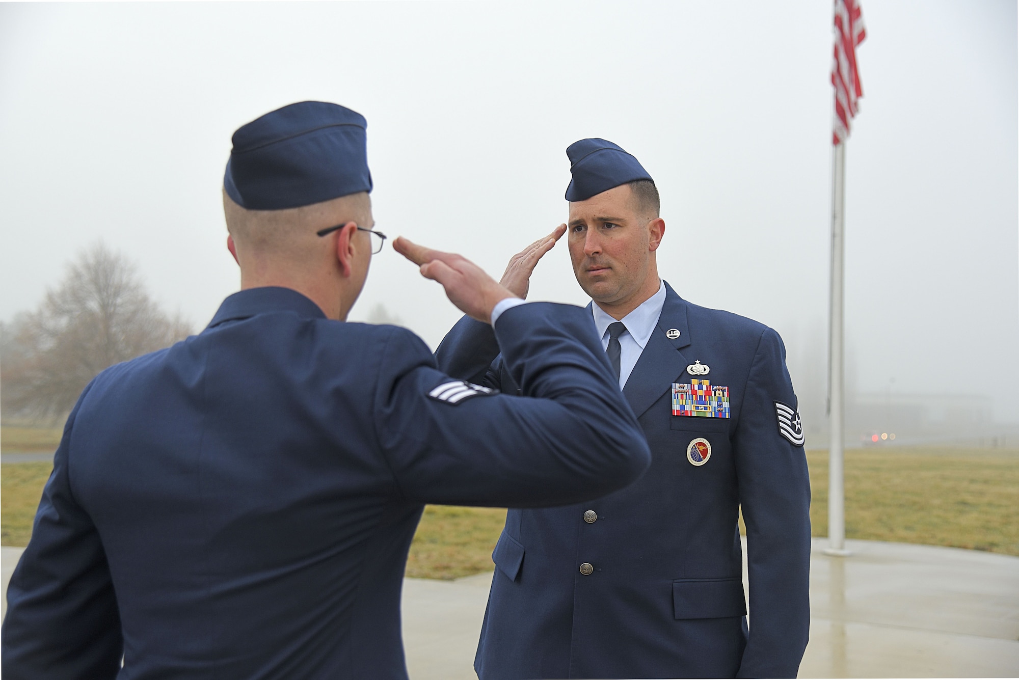 Tech. Sgt. Aaron Hastey, 92nd Force Support Squadron Airman Leadership School instructor, conducts a uniform inspection as one of the graduation requirements of ALS Nov. 21, 2017, at Fairchild Air Force Base, Washington. Hastey is one of four instructor cadre at Fairchild who use Thomas N. Barnes Center curriculum to prepare senior airman to become supervisors. (U.S. Air Force photo/Senior Airman Mackenzie Richardson)