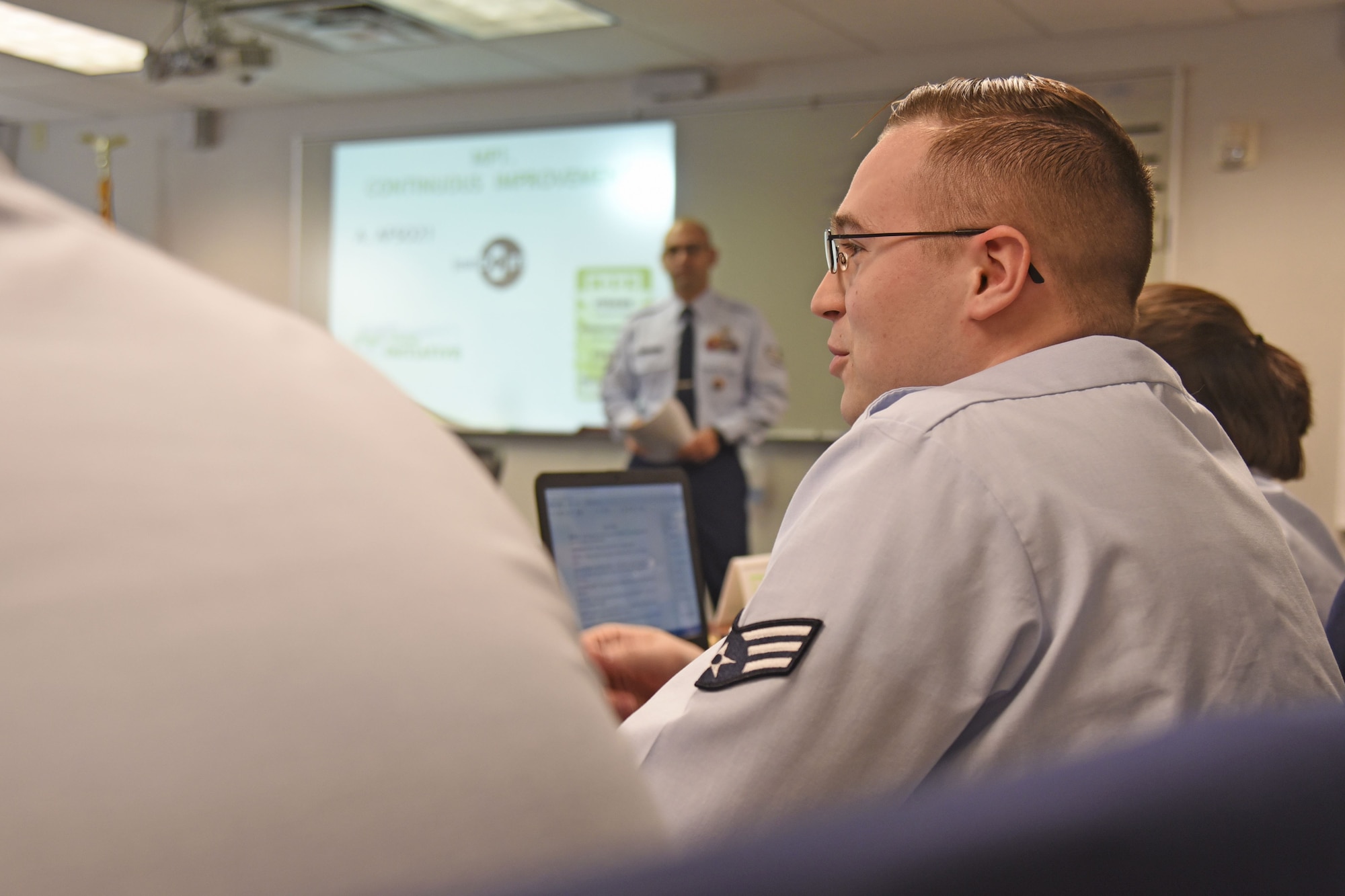 Senior Airman Eli Romesburg, 92nd Operations Support Squadron airfield systems journeyman, discusses waste in the Air Force with his Airman Leadership School classmates Nov. 27, 2017, at Fairchild Air Force Base, Washington. Discussing ways to reduce waste, care for resources and improve the force are just a few topics ALS instructor cadre discuss with their students. (U.S. Air Force photo/Senior Airman Mackenzie Richardson)