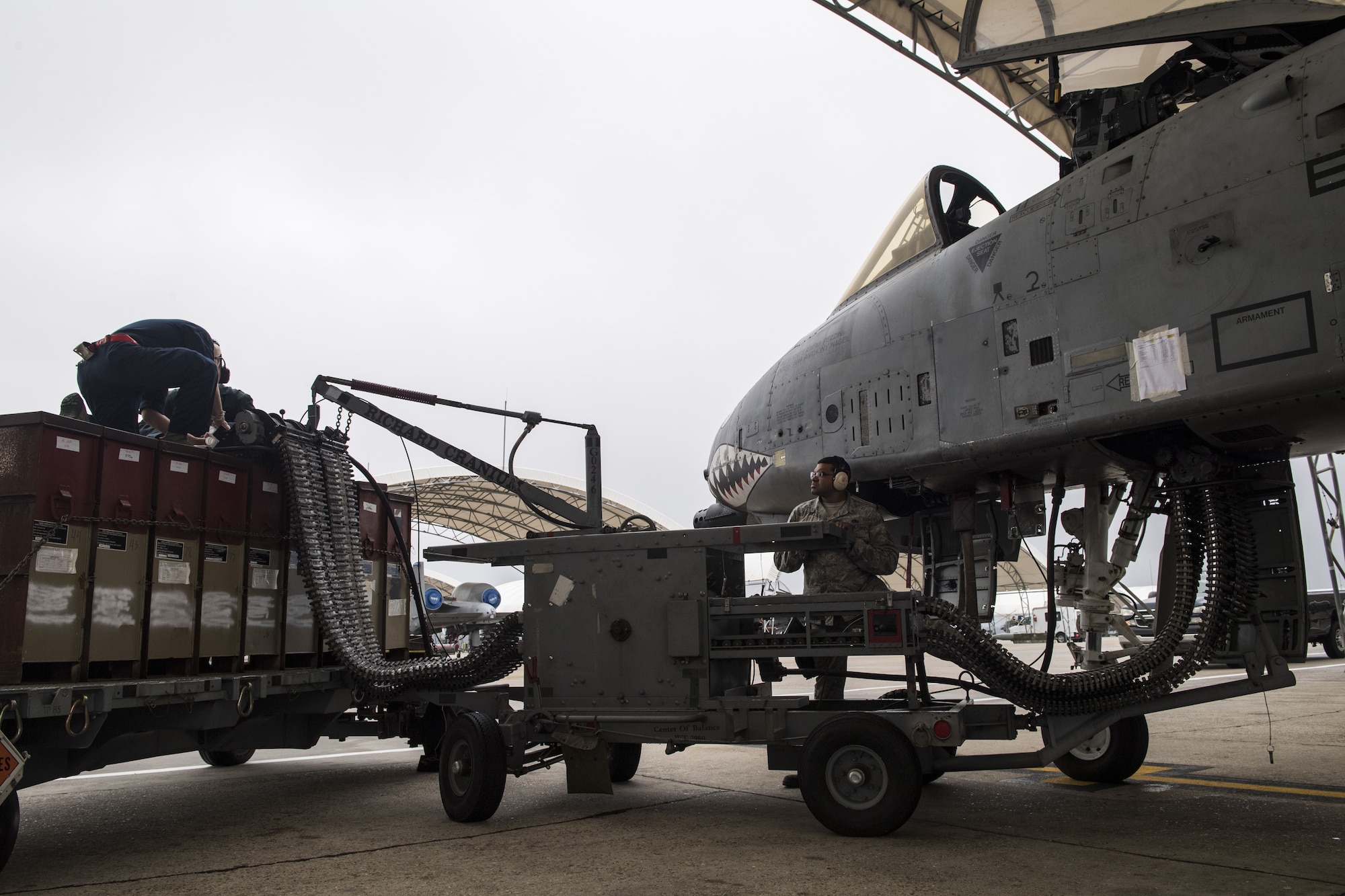 Airmen from the 23d Aircraft Maintenance Unit use an Ammunition Loading Assembly to reload 30 millimeter rounds into the GAU-8 Avenger autocannon of an A-10C Thunderbolt II during an exercise, Dec. 5, 2017, at Moody Air Force Base, Ga. During Moody’s Phase 1, Phase 2 exercise, leadership tested Airmen across maintenance units on their abilities to accurately and efficiently ready aircraft and cargo to deploy. The exercise tasked Airmen from various aircraft maintenance units (AMU) to generate 16 aircraft from Moody’s fleet of A-10C Thunderbolt II’s. (U.S. Air Force photo by Senior Airman Janiqua P. Robinson)