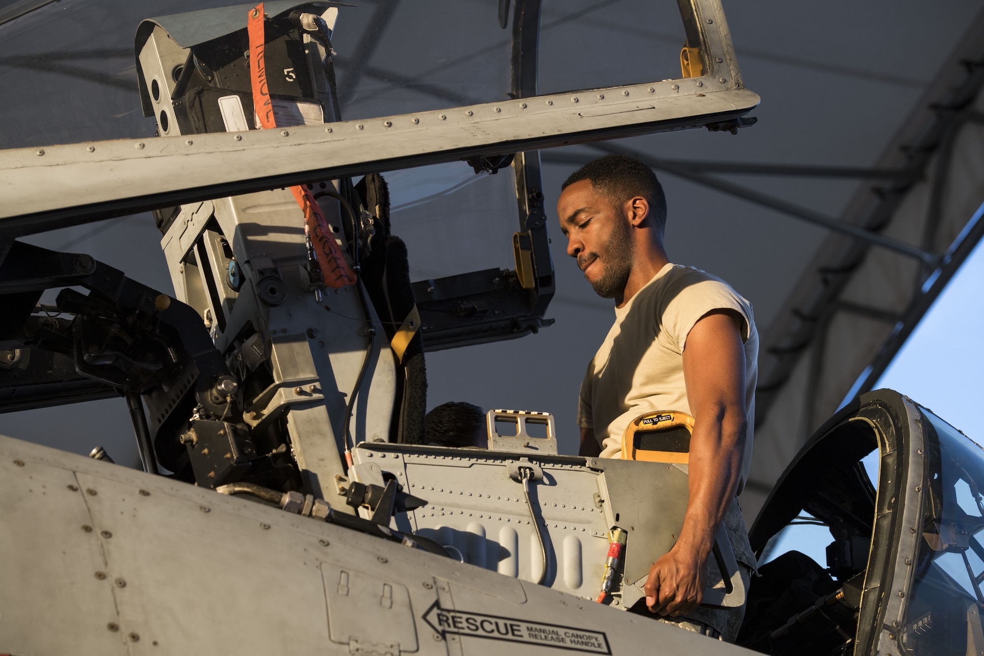Airman 1st Class Andre Francis, 23d Aircraft Maintenance Squadron  egress apprentice, adjusts a seat in the cockpit of an A-10C Thunderbolt II during an exercise, Dec. 5, 2017, at Moody Air Force Base, Ga. During Moody’s Phase 1, Phase 2 exercise, leadership tested Airmen across maintenance units on their abilities to accurately and efficiently ready aircraft and cargo to deploy. The exercise tasked Airmen from various aircraft maintenance units (AMU) to generate 16 aircraft from Moody’s fleet of A-10C Thunderbolt II’s. (U.S. Air Force photo by Senior Airman Janiqua P. Robinson)