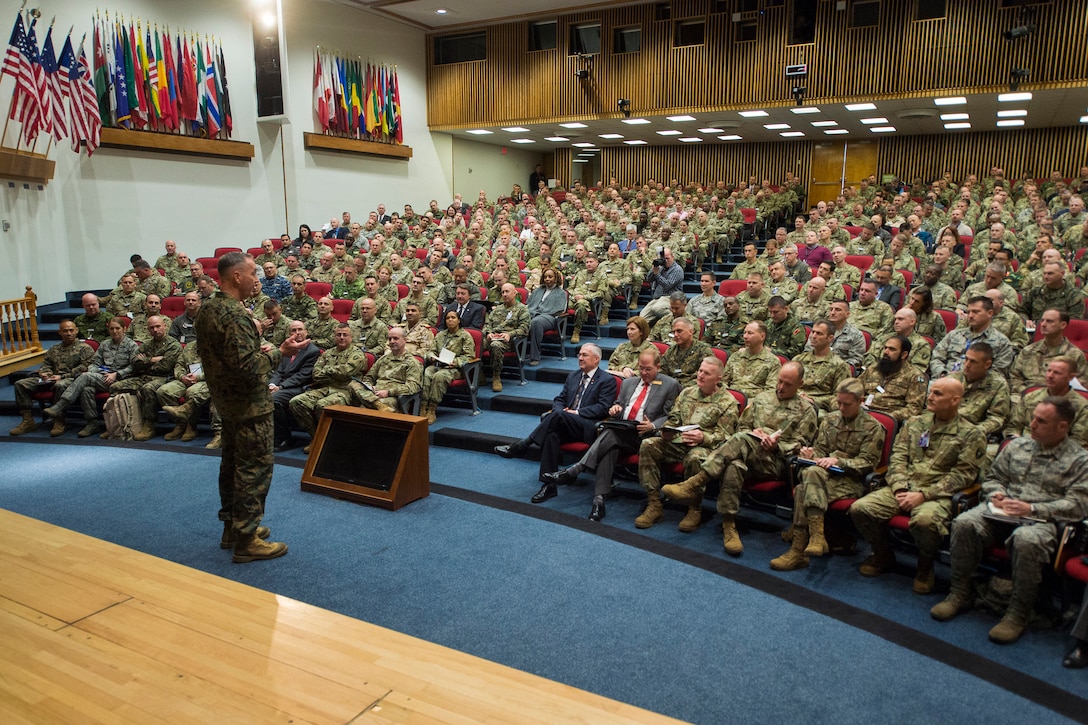 Marine Corps Gen. Joseph F. Dunford Jr. speaks with students in an auditorium