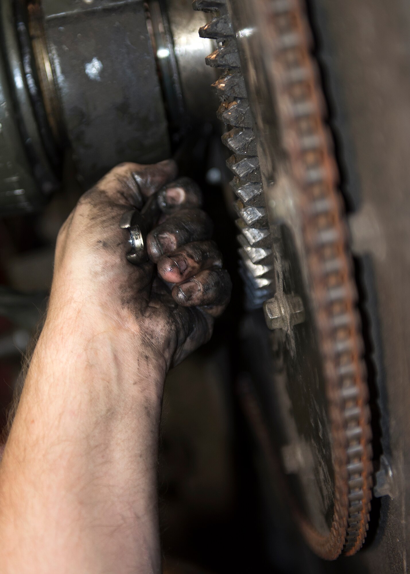 Senior Airman Johnathan Bailey, 49th Logistics Readiness Squadron mission generating vehicle and equipment maintenance journeyman, loosens bolts on a defective vehicle part at Holloman Air Force Base, N.M., Dec. 4, 2017. The shop consists of three Airmen that are responsible for maintenance and upkeep of the base’s refueling vehicles. (U.S. Air Force photo by Staff Sgt. Timothy M. Young)