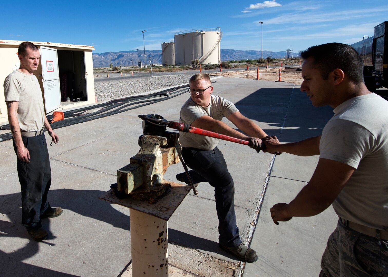 Airmen from the 49th Logistics Readiness Squadron refueling maintenance shop use a vise and wrench to separate two vehicle parts that have been leaking fuel at Holloman Air Force Base, N.M., Dec. 4, 2017. The shop consists of three Airmen that are responsible for maintenance and upkeep of the base’s refueling vehicles in support of Holloman’s mission. (U.S. Air Force photo by Staff Sgt. Timothy M. Young)