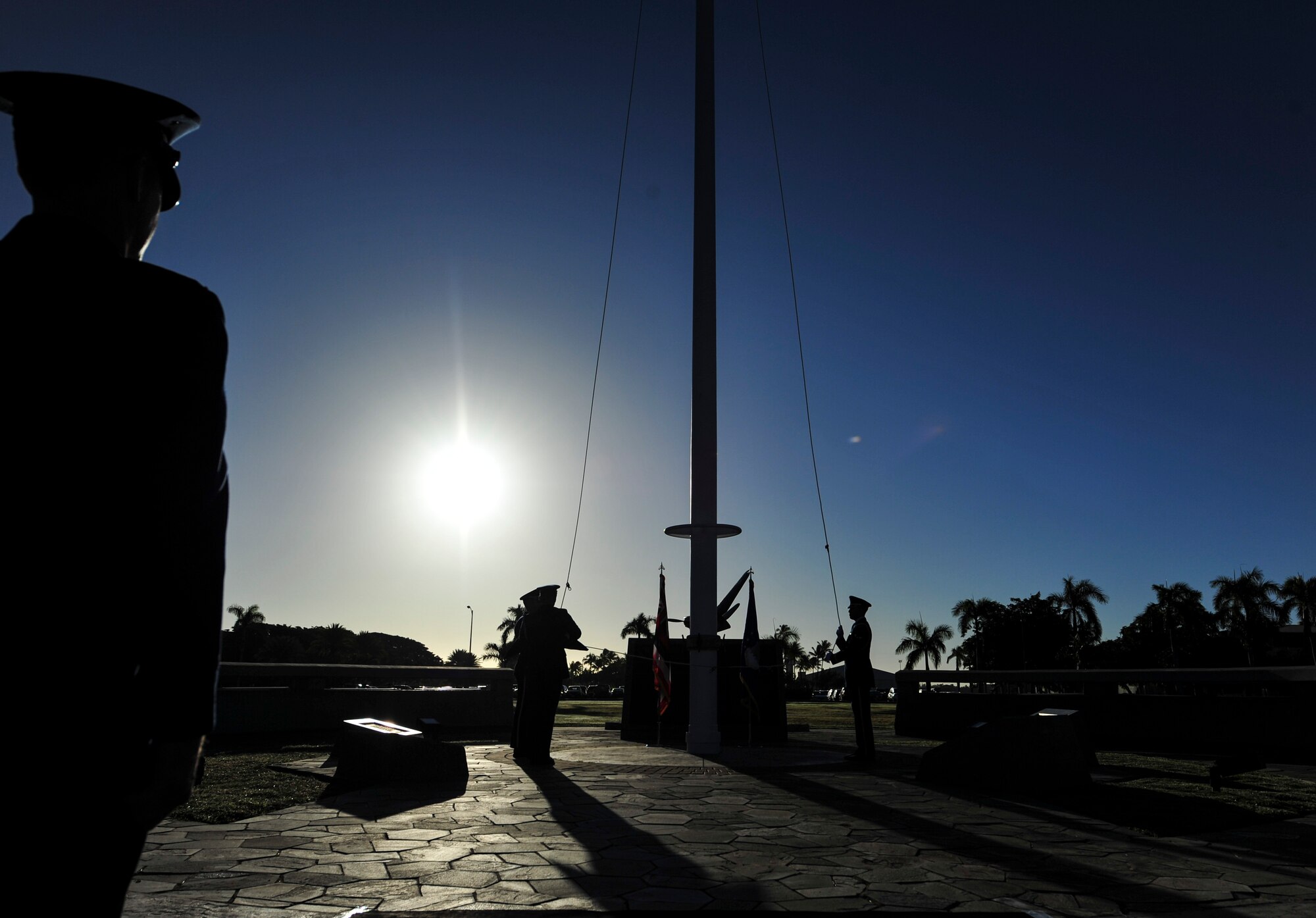 Members of the Hickam Honor Guard raise the flag during the 15th Wing’s Remembrance Ceremony, Joint Base Pearl Harbor-Hickam, Hawaii, Dec. 7, 2017. The 15th Wing sponsored the ceremony to remember the 76th anniversary of the attacks that claimed the lives of 189 Army Air Corps Airmen and civilians and injured 303 others. (U.S. Air Force photo by Tech. Sgt. Heather Redman)