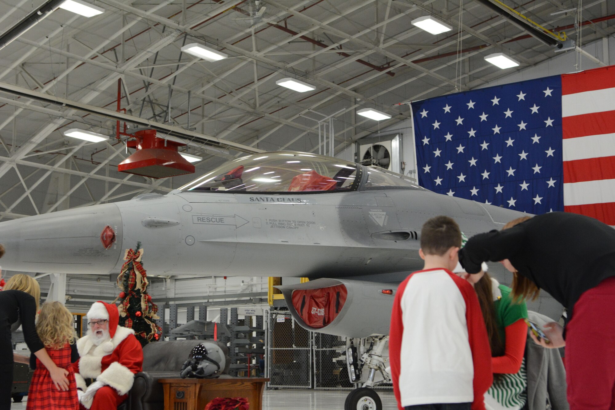 Members and their families of the 115th Fighter Wing came together to celebrate the annual Children’s Holiday party where they were able to take pictures with Santa and his jet and participate in holiday crafts and games.  Since 2010, the 115th Fighter Wing Family Support group has coordinated and run the event with the support of many volunteers and donations from external organizations. (U.S. Air National Guard photo by Tech. Sgt. Meghan Skrepenski, 115th Fighter Wing Public Affairs)
