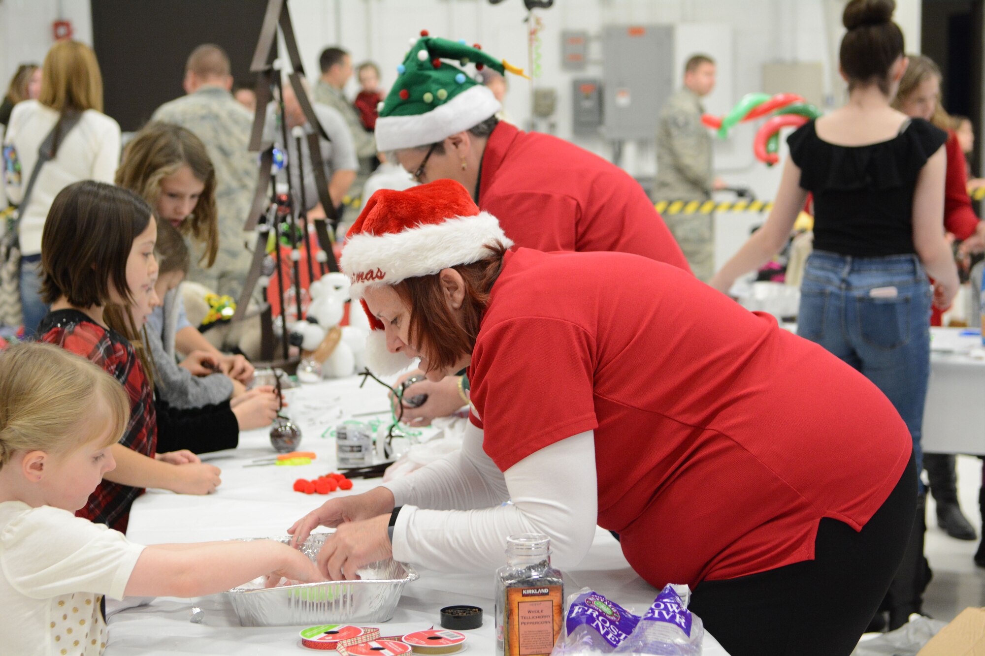 Members and their families of the 115th Fighter Wing came together to celebrate the annual Children’s Holiday party where they were able to take pictures with Santa and his jet and participate in holiday crafts and games.  Since 2010, the 115th Fighter Wing Family Support group has coordinated and run the event with the support of many volunteers and donations from external organizations. (U.S. Air National Guard photo by Tech. Sgt. Meghan Skrepenski, 115th Fighter Wing Public Affairs)