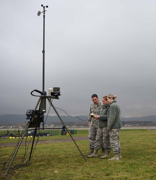 U.S. Airmen assigned to the 86th Operations Support Squadron fine tune settings on a Tactical Meteorological eQuipment – 53, on Ramstein Air Base, Germany, Nov. 8, 2017. The TMQ-53 is the deployable version of the Field Meteorological eQuipment – 19. It is less precise than the FMQ-19 but has the same function.