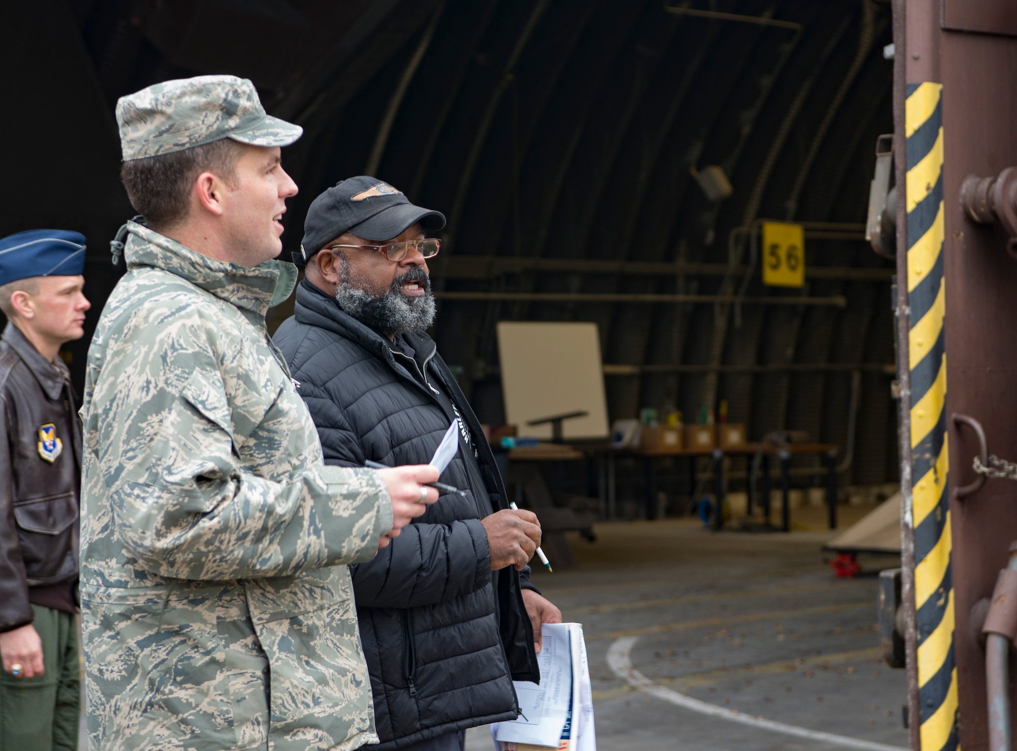 William Hendricks, right, Headquarters United States Air Forces in Europe Arms Control and Counter Proliferation treaty compliance officer, roleplays as an inspector during a Conventional Arms Forces in Europe Inspection Exercise on Ramstein Air Base, Germany, Dec. 6, 2017. The treaty establishes that at any moment, any of the 30 countries can announce that they are giving 36 hours’ notice before inspecting Ramstein Air for combat capabilities such as combat aircraft. (U.S. Air Force photo by Senior Airman Elizabeth Baker)