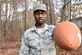U.S. Air Force Airman 1st Class Jaron Augustus, 86th Communications Squadron, systems technician, holds a football while posing for a photo on Ramstein Air Base Dec. 7, 2017. Augustus was selected to represent his unit in the Salute to Service event held in New Orleans, Lousiana, Nov. 6, 2017.