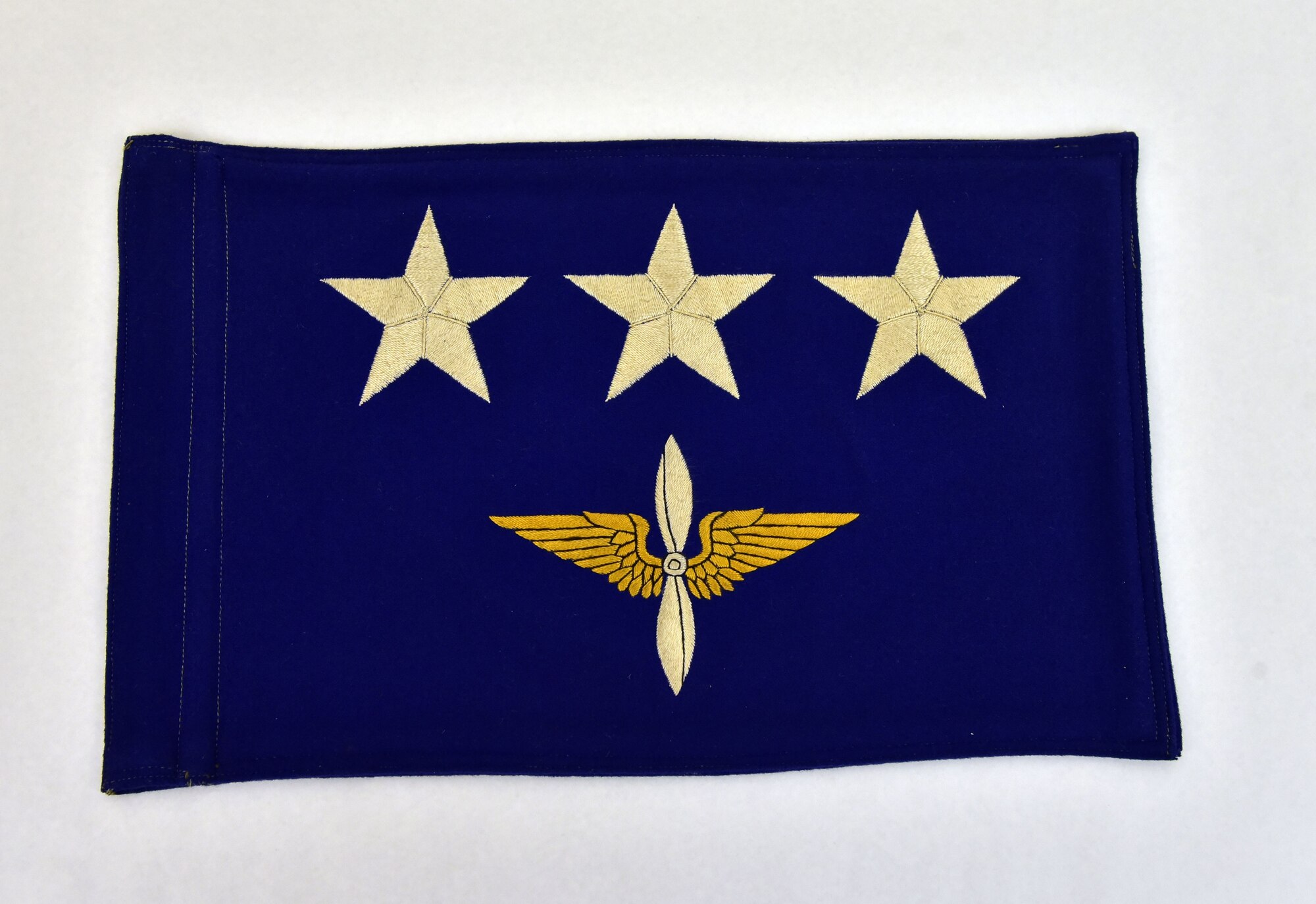 Plans call for this artifact to be displayed near the B-17F Memphis Belle™ as part of the new strategic bombardment exhibit in the WWII Gallery, which opens to the public on May 17, 2018. Three-star general’s flag flown on Lt Gen James “Jimmy” Doolittle’s staff car while he commanded the Eighth Air Force.