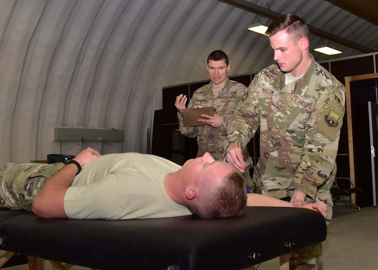 With the help of a colleague, Capt. Eric Walter, 386th Expeditionary Medical Group physical therapy element chief, has developed a proactive approach to physical therapy at an undisclosed location in Southwest Asia.