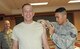 Staff Sgt. Tam Nguyen, 78th Medical Group Immunization Clinic noncommissioned officer in charge, administers a flu shot to Col. Lyle Drew, 78th Air Base Wing commander. The Influenza vaccine is here and available for all TRICARE beneficiaries. The goal is to have 90 percent of the active duty and Reserve population vaccinated by Dec. 15. Group commanders and first sergeants will coordinate with the immunization clinic to schedule a point of distribution to administer the vaccine within their groups. There is no need to schedule an appointment, walk-ins are accepted in the immunization clinic, Mondays through Fridays from 7:30 a.m. to 4:30 p.m. (U.S. Air Force photo/RAYMOND CRAYTON, JR.)