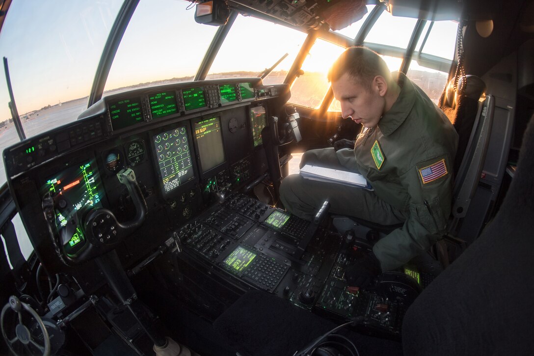 Airman 1st Class Jacob Cutler, 61st Airlift Squadron, conducts a pre-flight inspection on a C-130J Hercules at Pope Army Airfield, N.C., Nov. 28, 2017. Airmen from the 43rd Air Mobility Squadron loaded cargo on the aircraft in support of the Army’s 82nd Airborne Division during a Battalion Mass Tactical exercise. (U.S. Air Force photo by Marc Barnes)