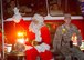 Santa Claus waves to the crowd during the Holiday Parade Dec. 5, 2017, at the Eagle Heights family housing on Dover Air Force Base, Del.