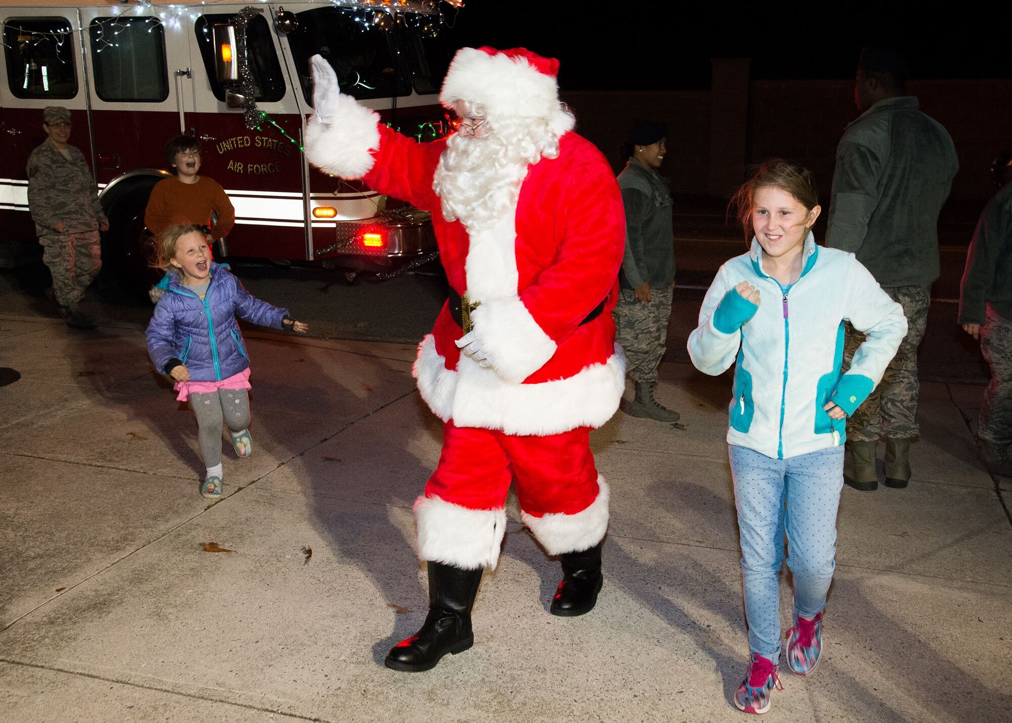 Santa Claus arrives at Chapel 2 following the Christmas Tree Lighting ceremony Dec. 5, 2017, at the Eagle Heights family housing on Dover Air Force Base, Del.