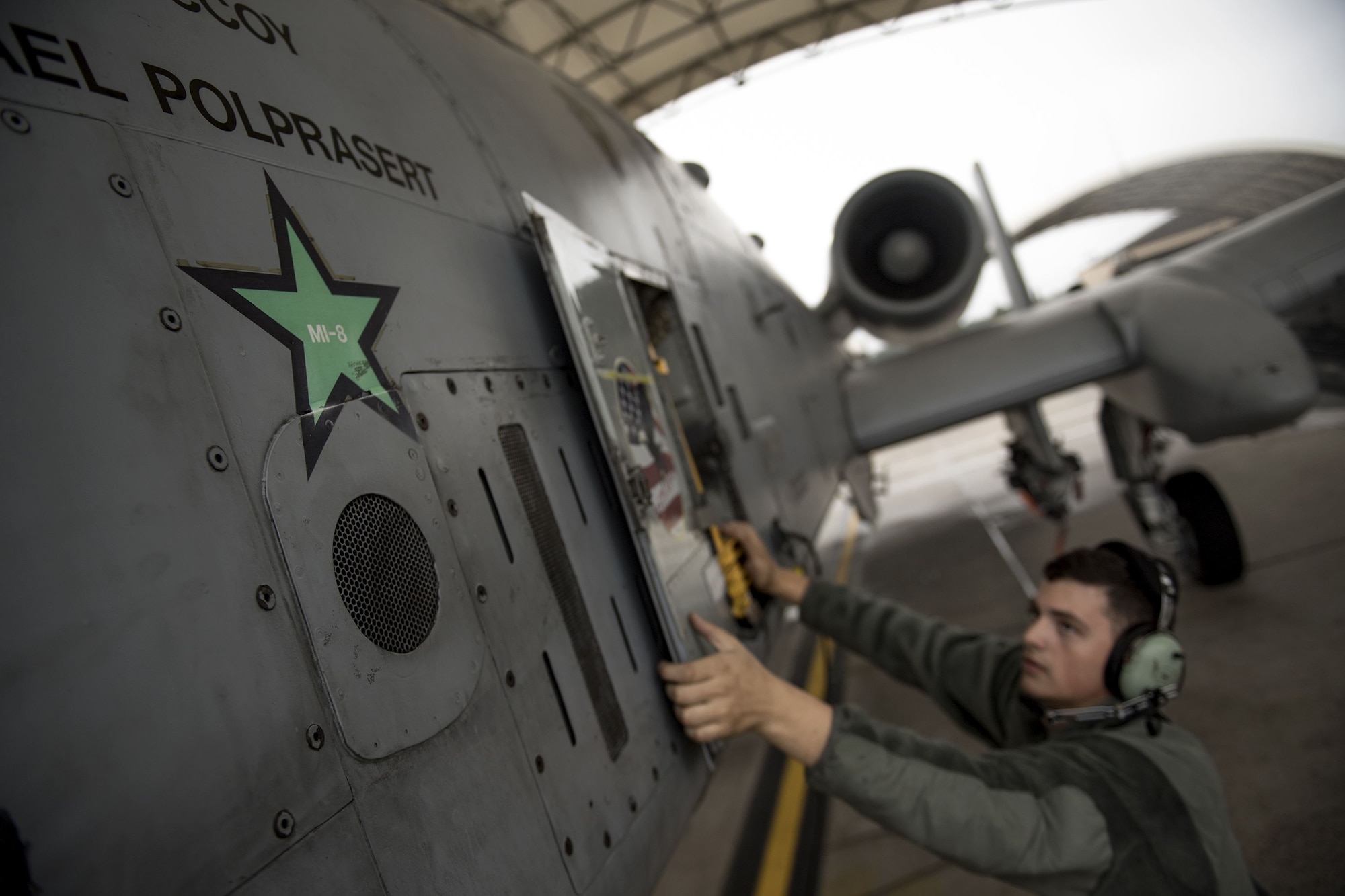 Airman 1st Class Kaya Schmidt, 74th Aircraft Maintenance Unit crew chief, secures an aircraft panel on the side of an A-10C Thunderbolt II, Dec. 6, 2017, at Moody Air Force Base, Ga. Moody’s week-long, Phase 1, Phase 2 exercise is designed to demonstrate the 23d Wing’s ability to meet combatant commander objectives and tested the pilots’ and maintainers’ ability to launch around-the-clock sorties at an accelerated rate during a sortie surge. (U.S. Air Force photo by Staff Sgt. Ryan Callaghan)