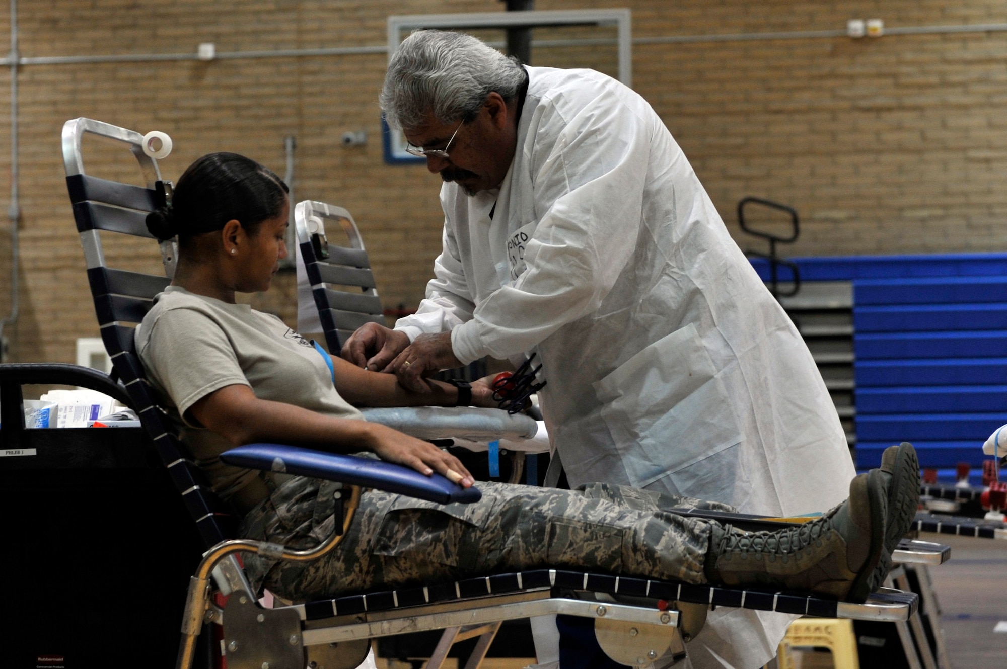 Master Sgt. Pricila Thomas, 56th Medical Group public health flight chief, prepares to donate her blood at Luke Air Force Base, Ariz., Dec. 7, 2017. The event was sponsored by the Armed Services Blood Program.  (U.S. Air Force photo/Senior Airman Pedro Mota)