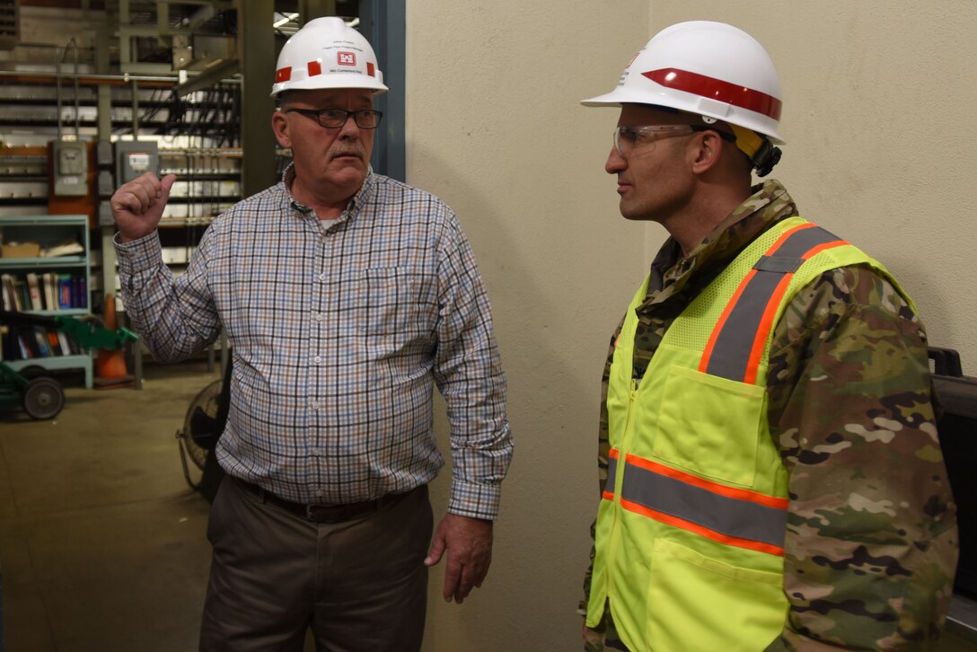 Col. Paul Kremer (Right), U.S. Army Corps of Engineers Great Lakes and Ohio River Division acting commander, gets briefed by Jeff Flowers, power plant project manager for the Nashville District’s Mid-Cumberland Area, during a tour of the Center Hill Dam power plant Dec. 5, 2017 in Lancaster, Tenn. (USACE photo by Lee Roberts)
