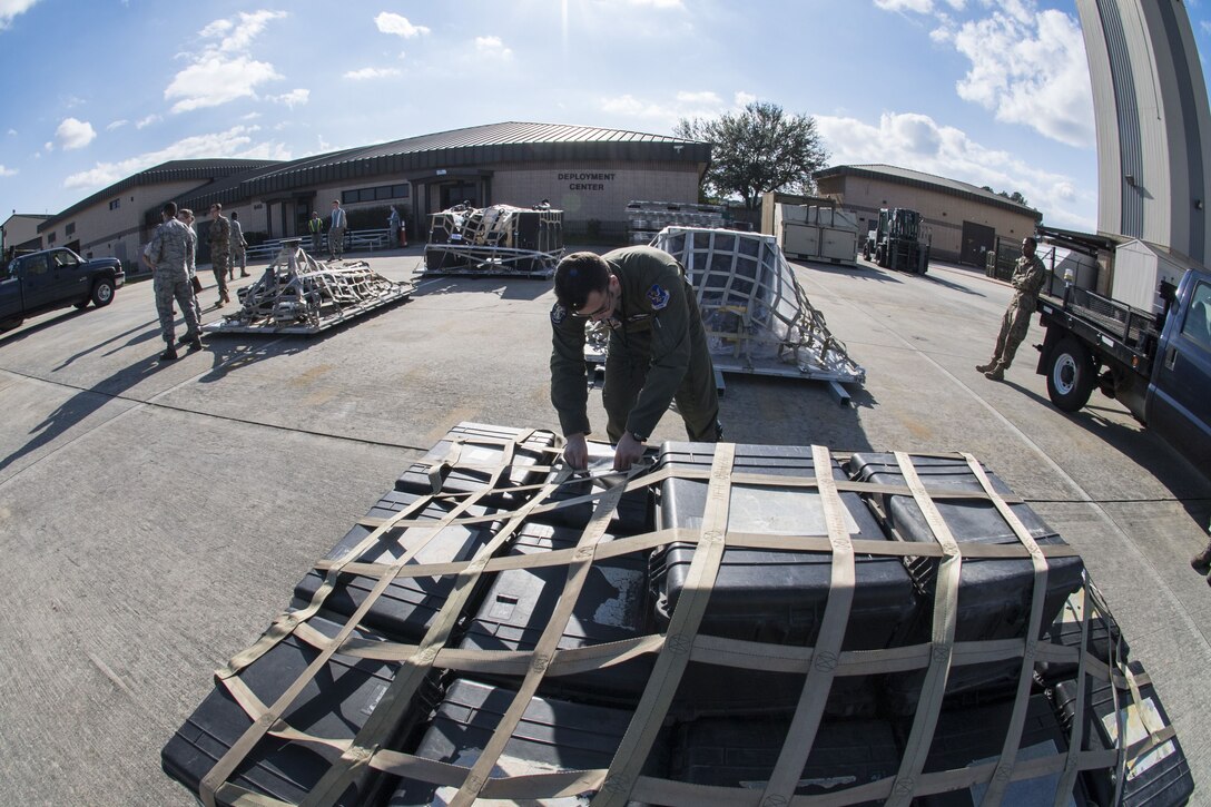 An Airman ensures paperwork on a cargo shipment is up-to-date during an exercise, Dec. 4, 2017, at Moody Air Force Base, Ga. Moody’s Phase 1, Phase 2 exercise tested the 23d Wing’s ability to prepare, deploy and execute their mission at a moment’s notice. Airmen from the 23d Logistics Readiness Squadron were evaluated on their ability to prepare, pack and ship supplies for squadrons tasked to deploy. (U.S. Air Force photo by Senior Airman Janiqua P. Robinson)