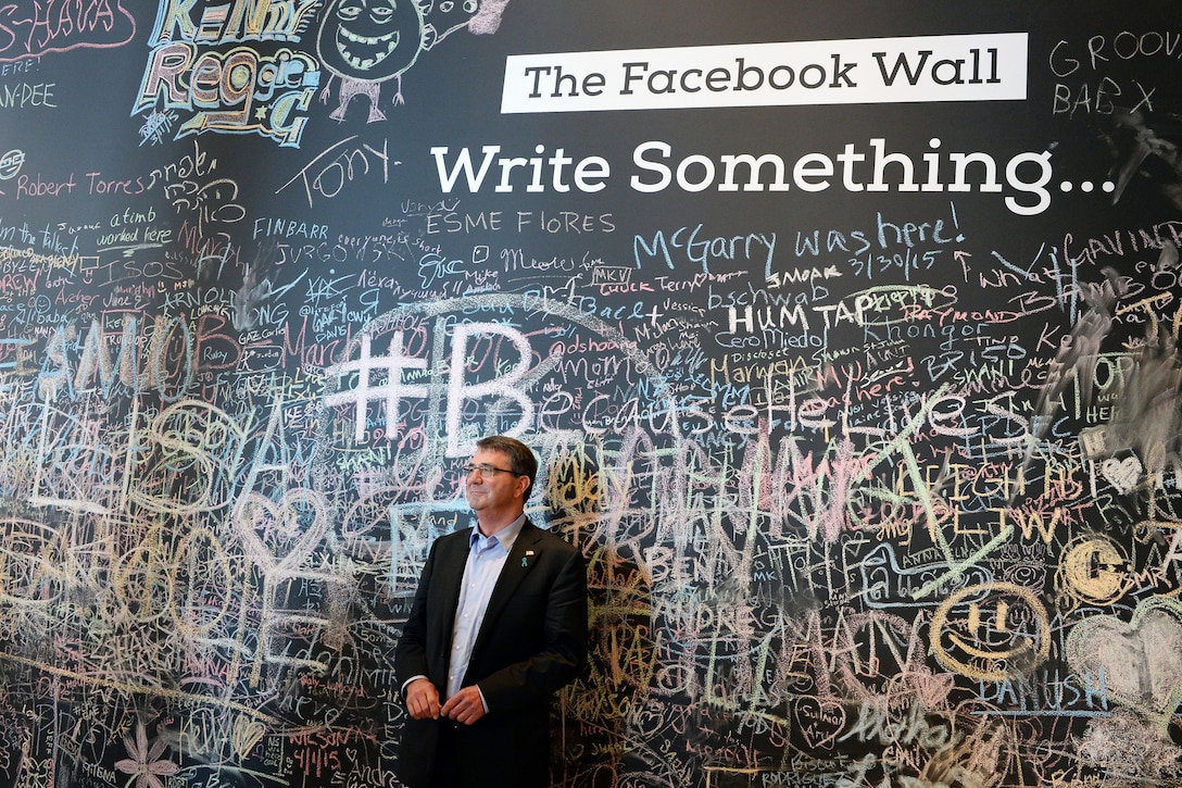 Former U.S. Secretary of Defense Ashton Carter stands in front of the Facebook wall during his visit to the company
headquarters in 2014. Before the visit, the Defense Secretary unveiled DOD’s cyber strategy at Stanford University.